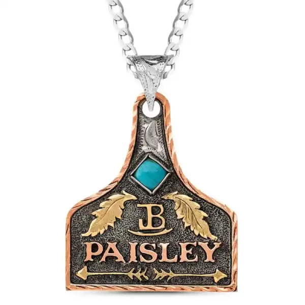 The Patty Cow Tag Necklace is crafted on a matted German Silver base with a signature antique finish. Featuring a Copper straight edge, Jeweler's Bronze feathers, and Copper lettering, this necklace blends classic style with detailed artistry. Customize t